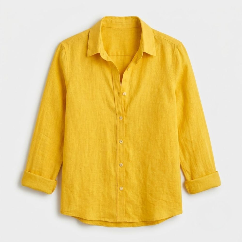 Blusa feminina amarela em linho com corte solto, gola clássica e botões frontais, ideal para looks de verão.