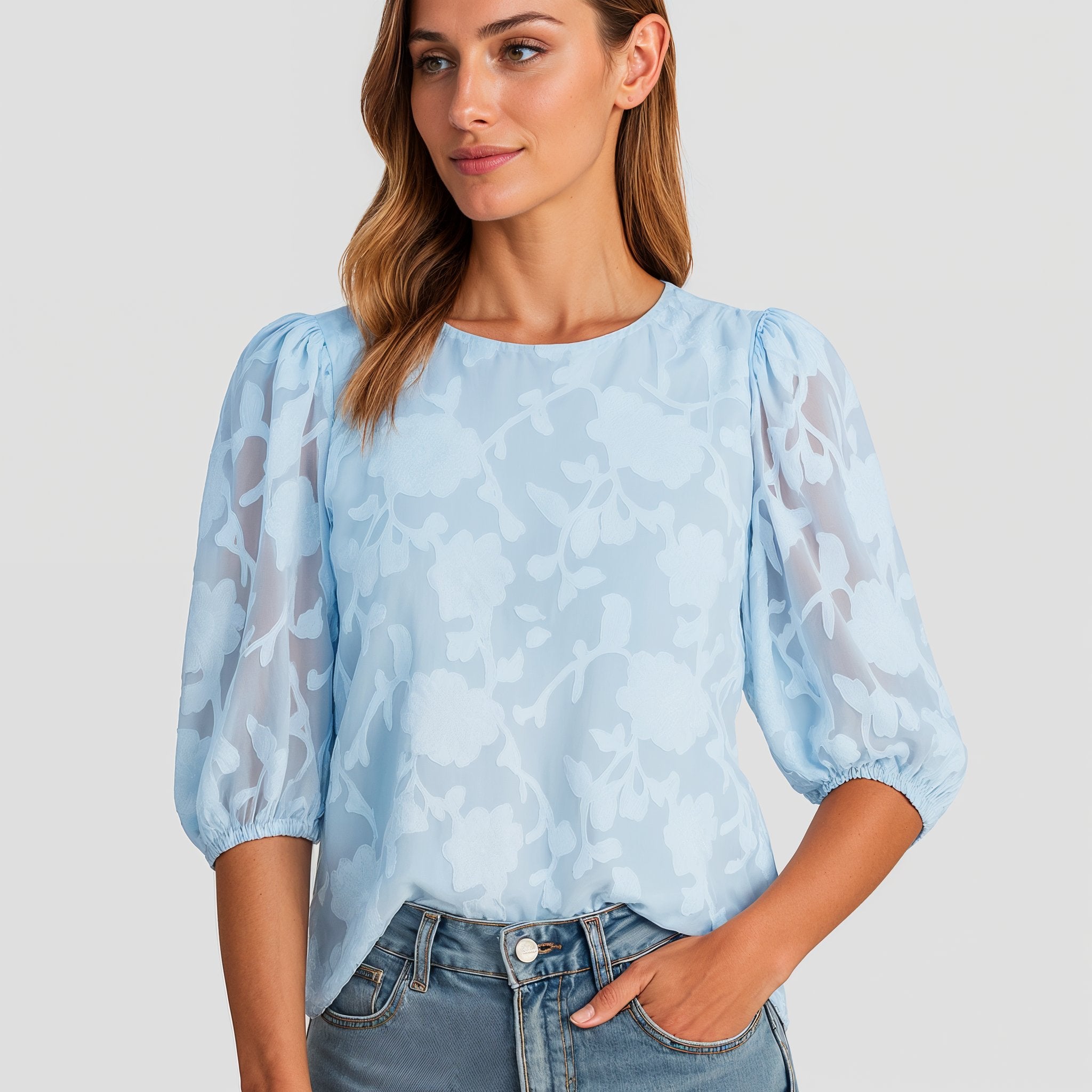Blusa estruturada com mangas abalonadas em jacquard