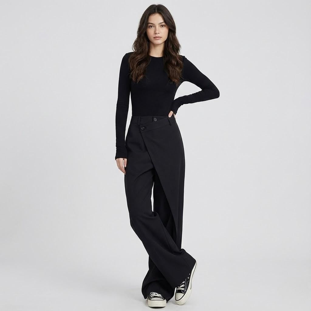 Calças assimétricas de alfaiataria | Corte largo | Fecho duplo contemporâneo