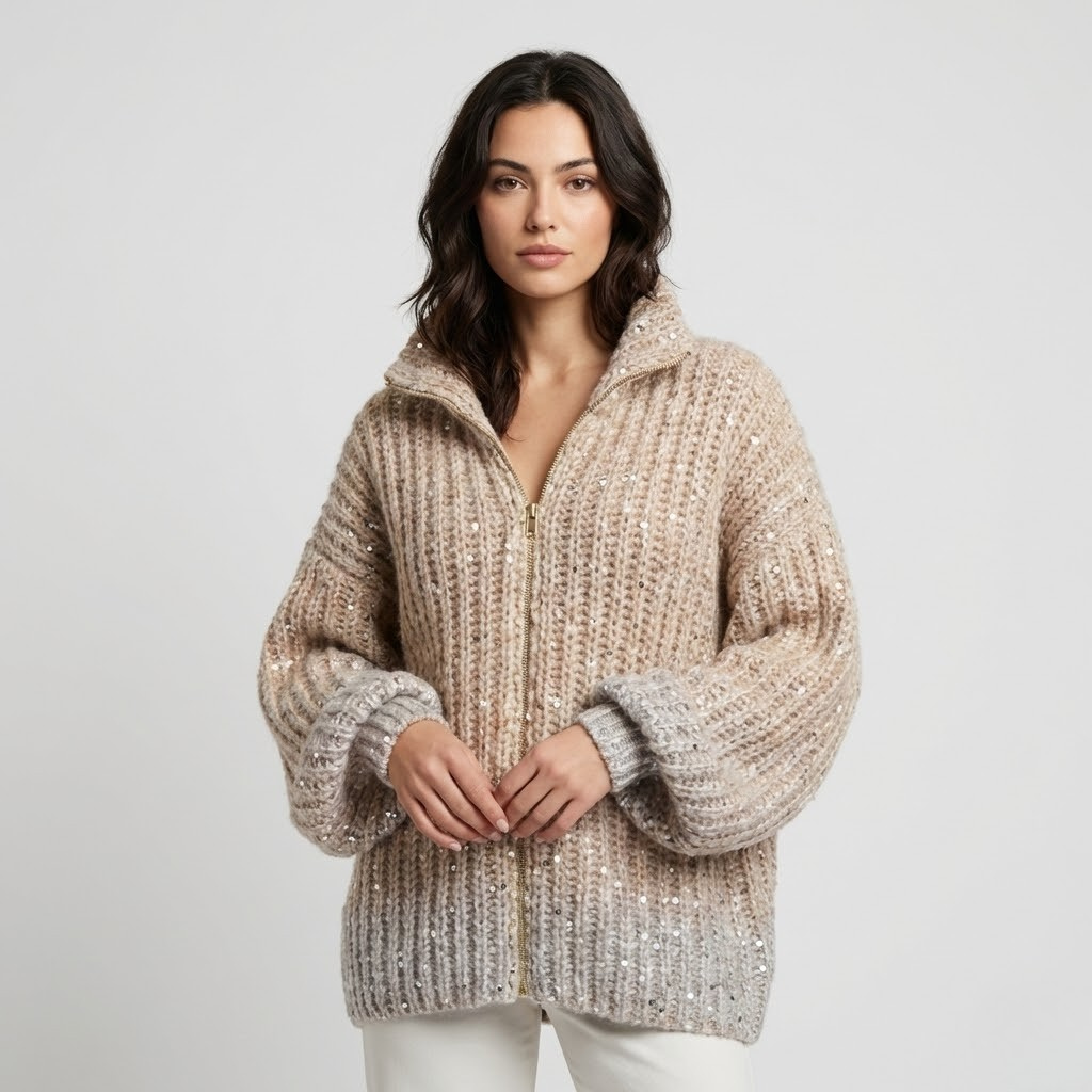 Camisola de malha volumosa com brilho subtil | Corte amplo | Fecho frontal com gola alta