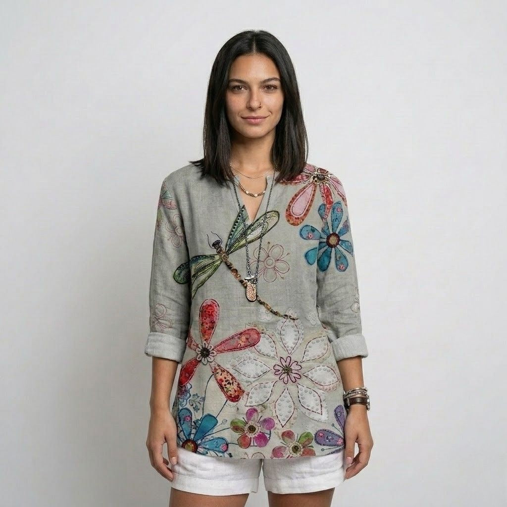 Blusa Fluida Estampada com Decote Aberto e Mangas Ajustáveis