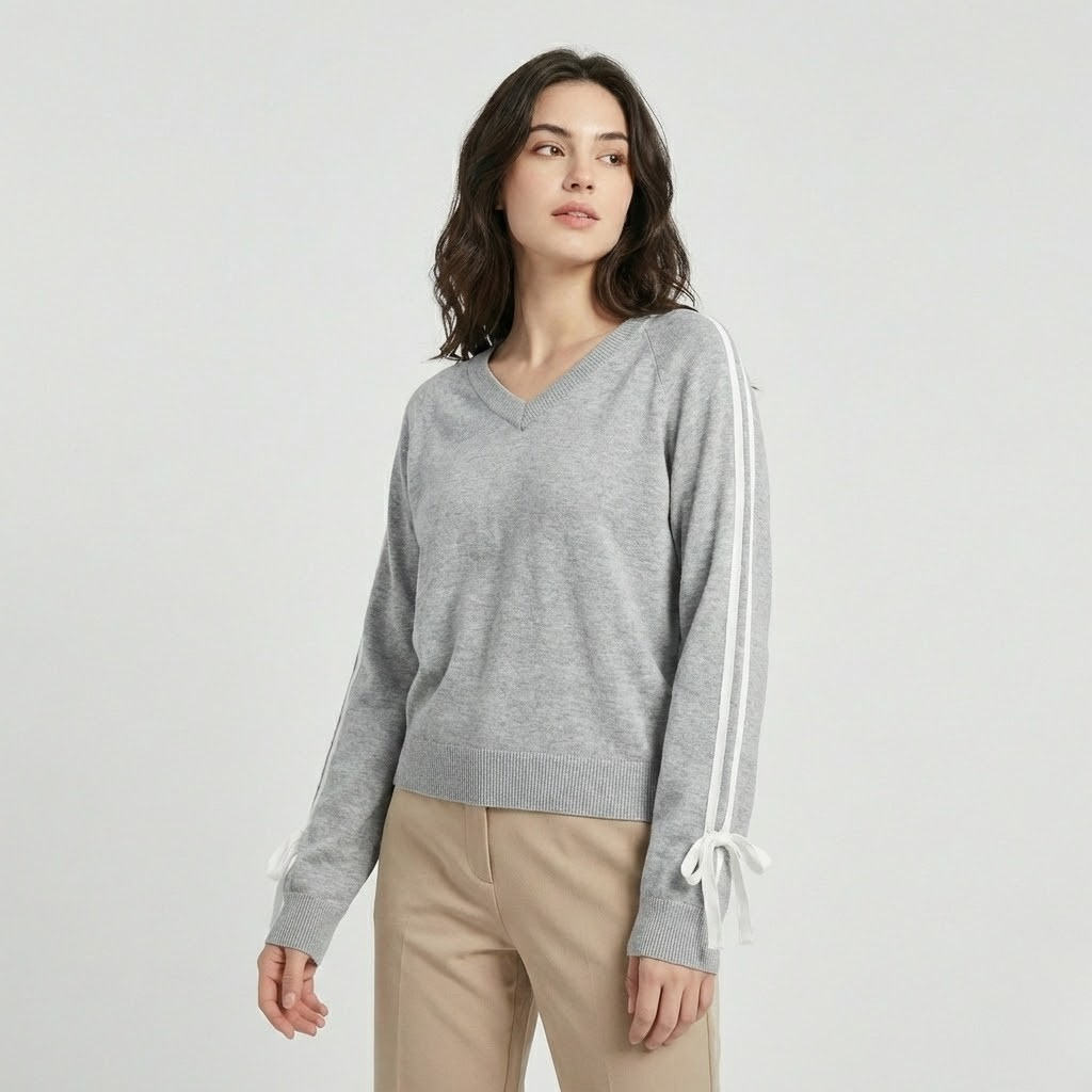 Camisola em malha suave com decote em V | Corte descontraído | Detalhe contrastante nas mangas